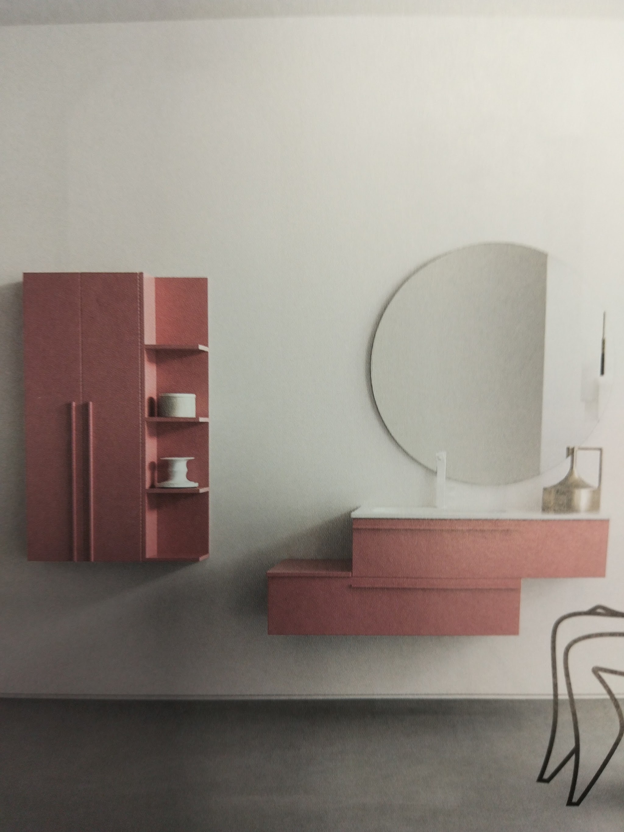 Composizione bagno color terracotta con specchio tondo